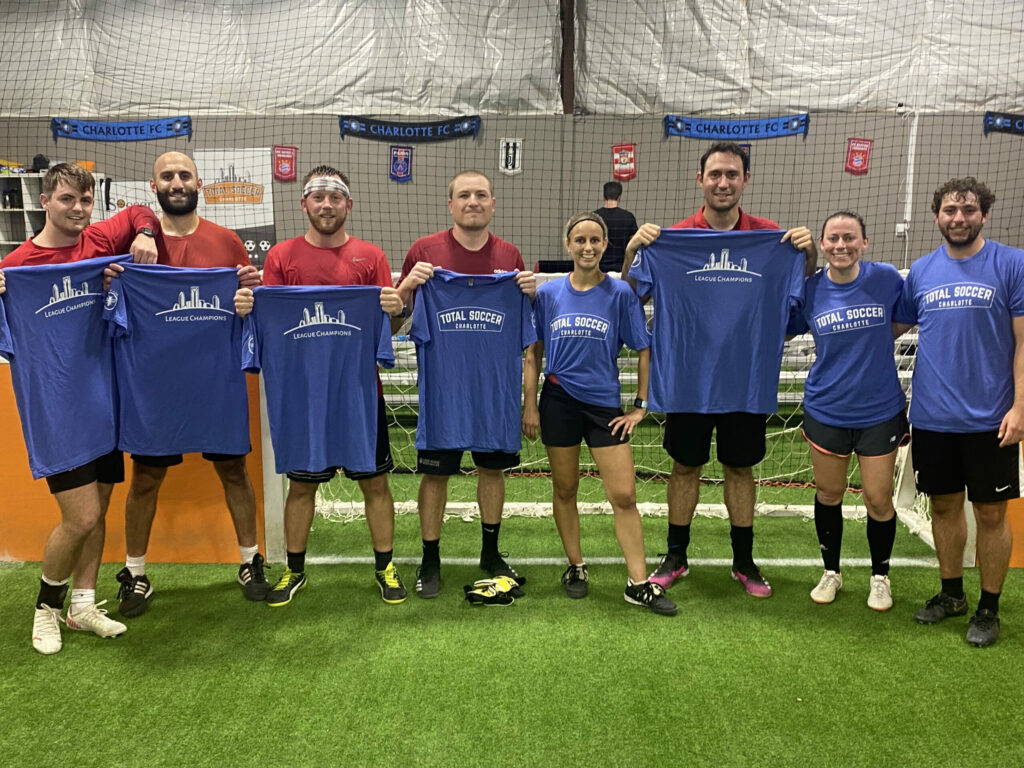 Adult indoor league team shows off their league shirts! Register today!