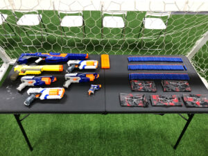 NERF supplies set up for child's party at indoor facility